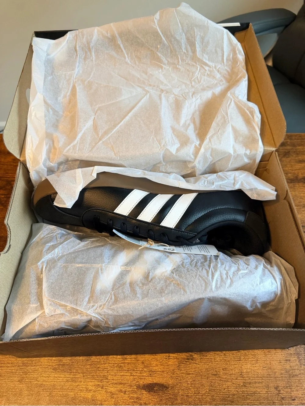 adidas Black Sneakers with White Stripes and Brown Sole